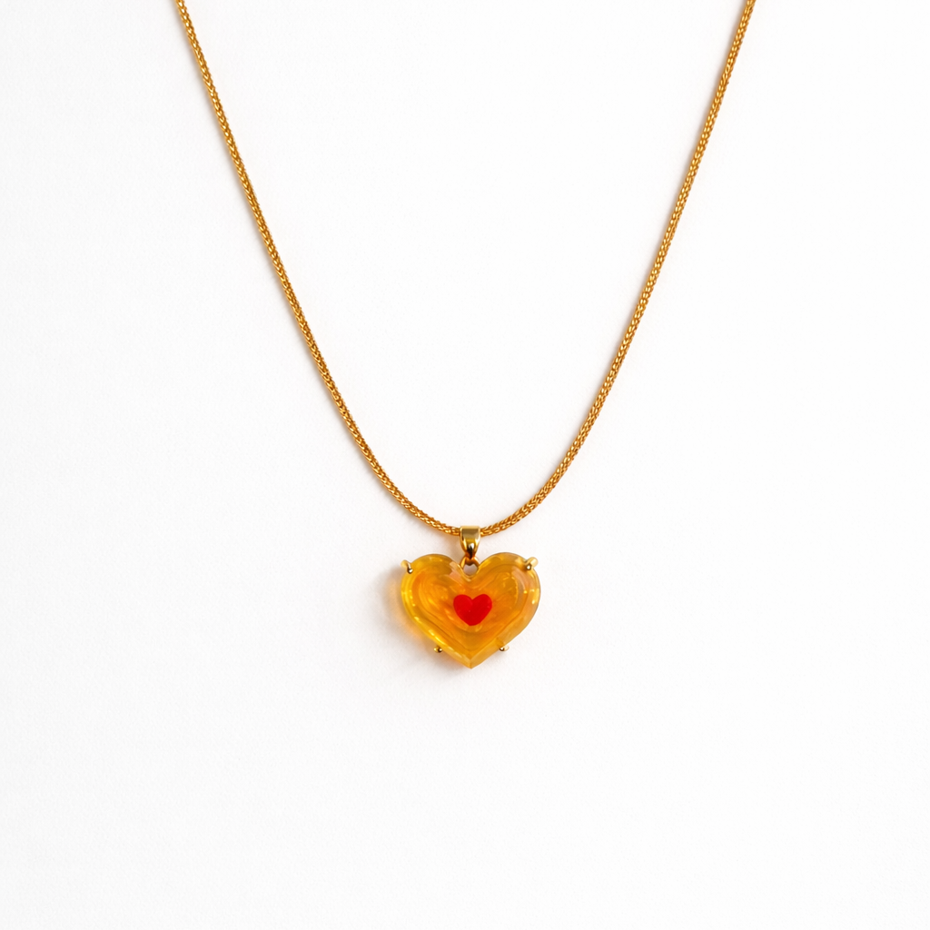 amber heart pendant necklace with red heart center