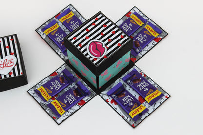5 Star chocolate explosion box open with Cadbury Dairy Milk chocolates on four panels