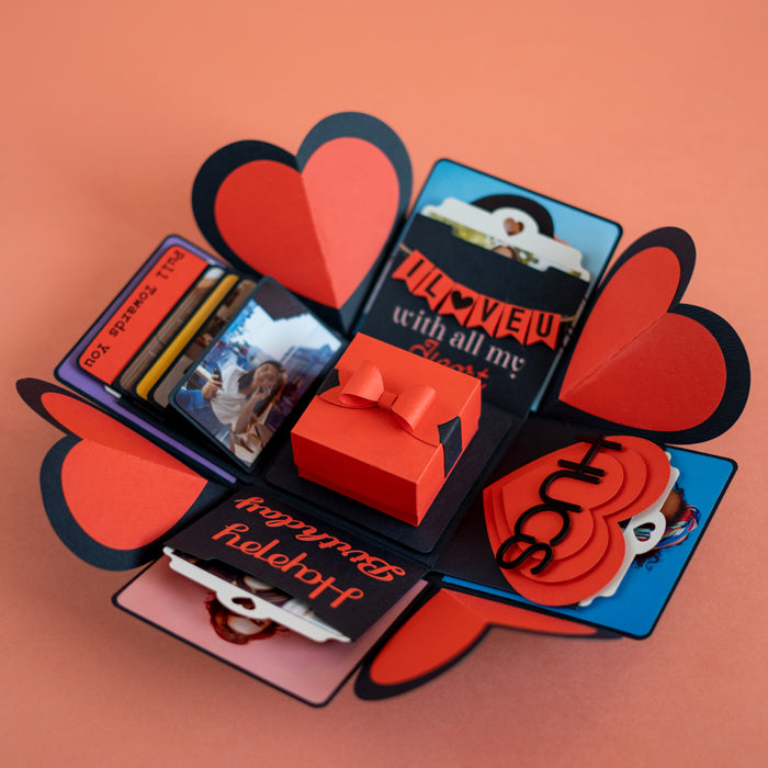 Explosion Box Red Luxe open with heart-shaped panels and photo sections
